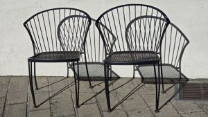 Chair shadows in Custom House Plaza